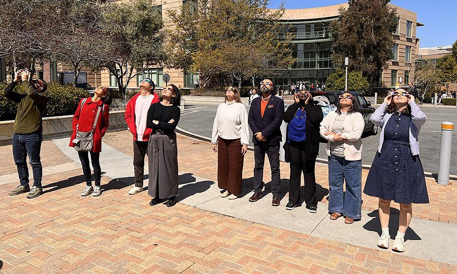 Humanities Center members safely watching Solar Eclipse